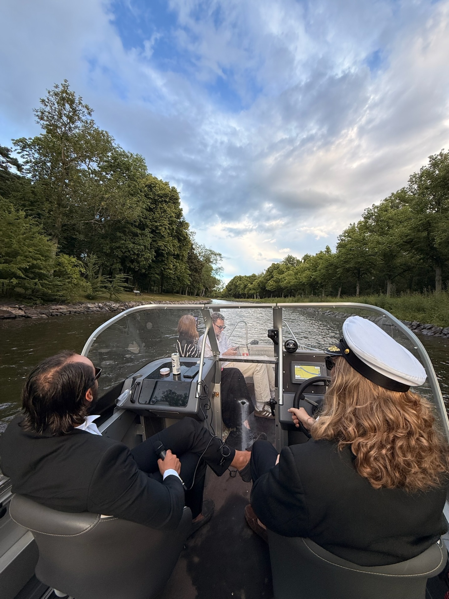 Cruising the green canal from the back of the boat